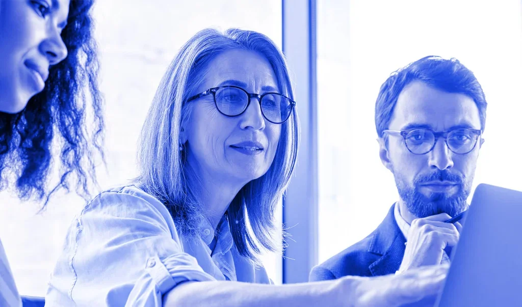 team working on laptop